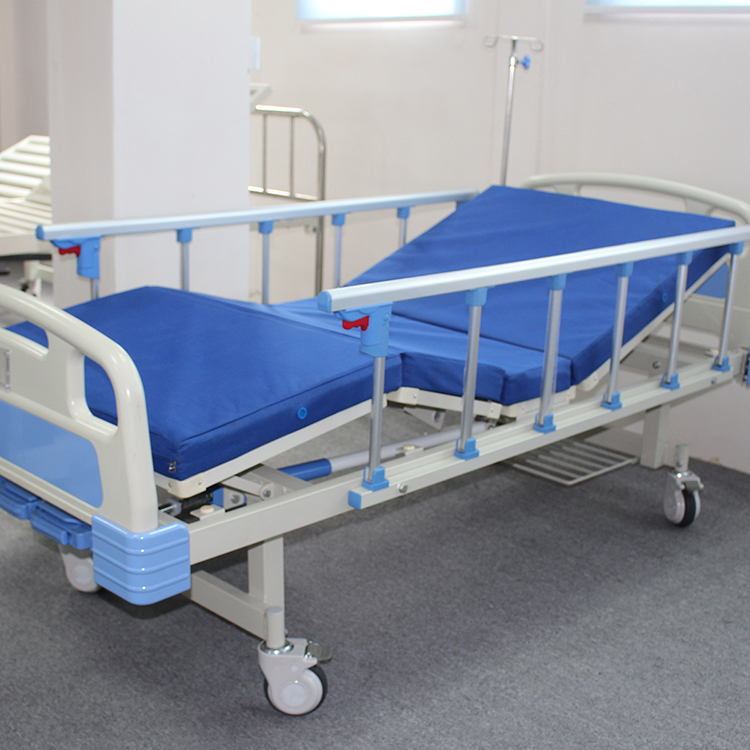 Proveedor barato Cama de hospital manual de dos funciones con manivela de ABS plegable para cuidados de enfermería en Pakistán