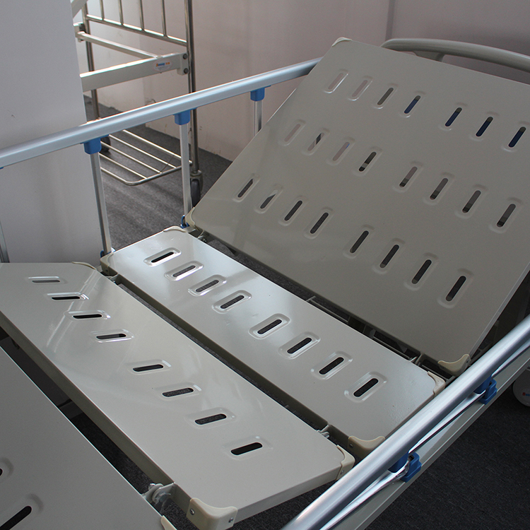 Proveedor barato Cama de hospital manual de dos funciones con manivela de ABS plegable para cuidados de enfermería en Pakistán
